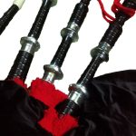 Bagpipe Black Mounts with Red Flare closeup