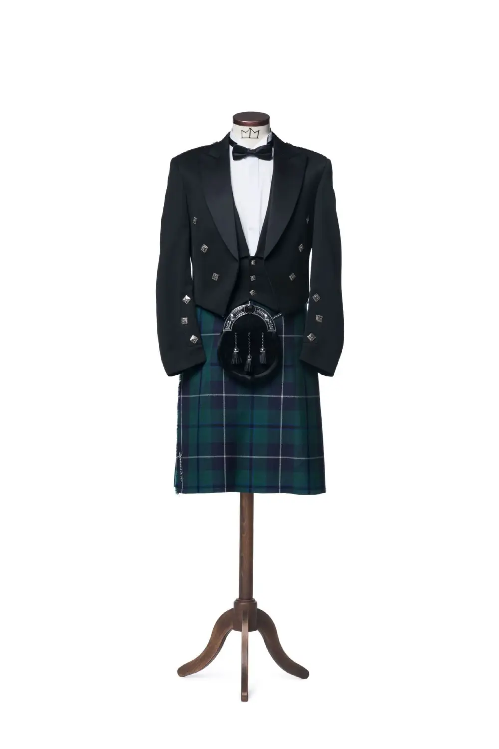 A Prince Charlie Kilt Outfit hanged in a hanger.