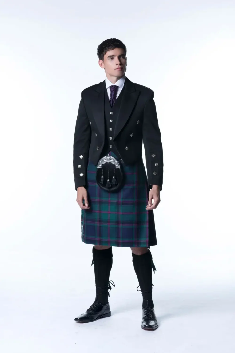 Prince-Charlie-Kilt-Outfit-with-5-button-vest (1) A man wearing Prince Charlie Kilt Outfit with 5 button Vest.