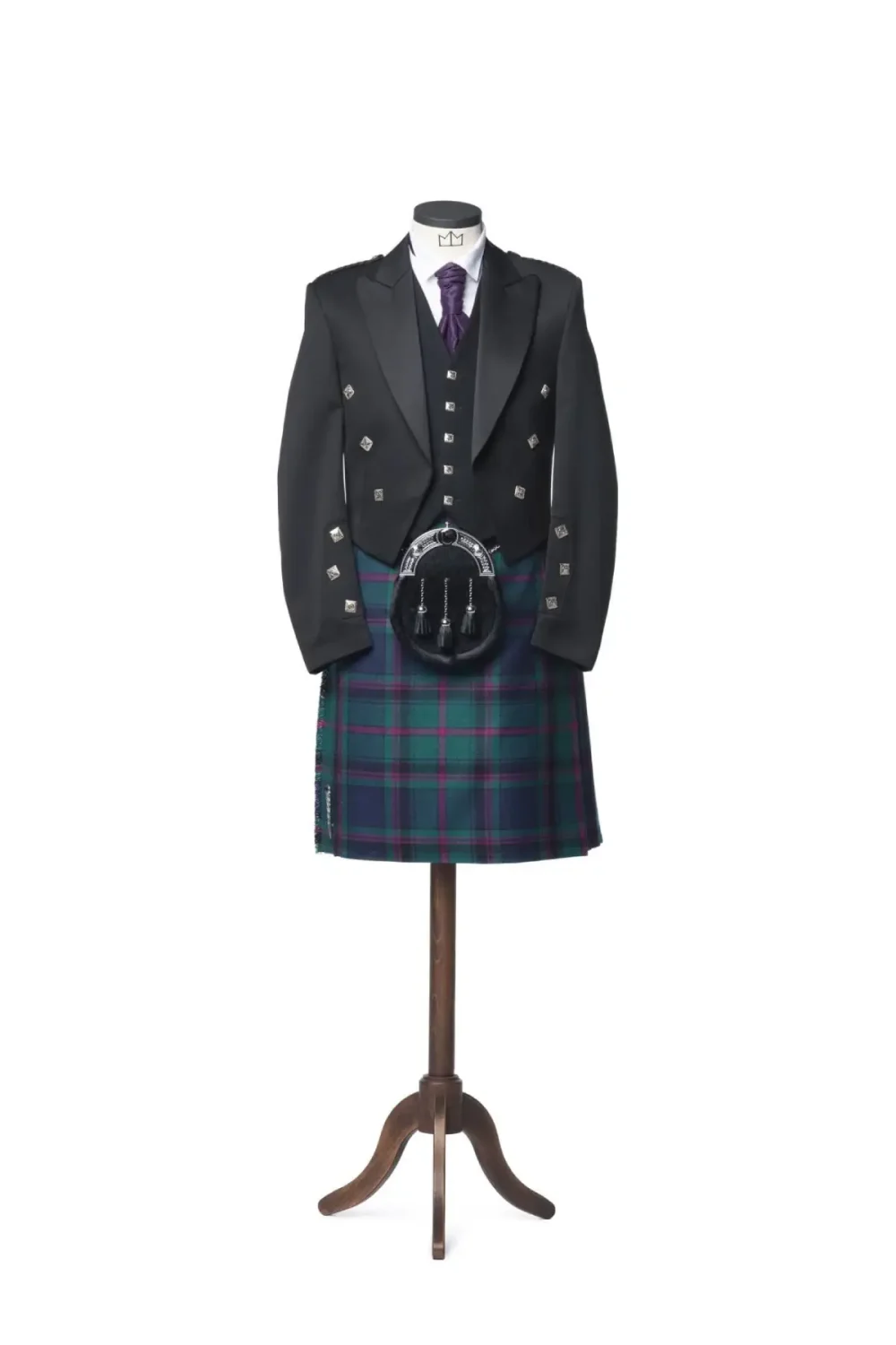 A Prince Charlie Kilt Outfit with 5 button Vest hanged in a hanger.