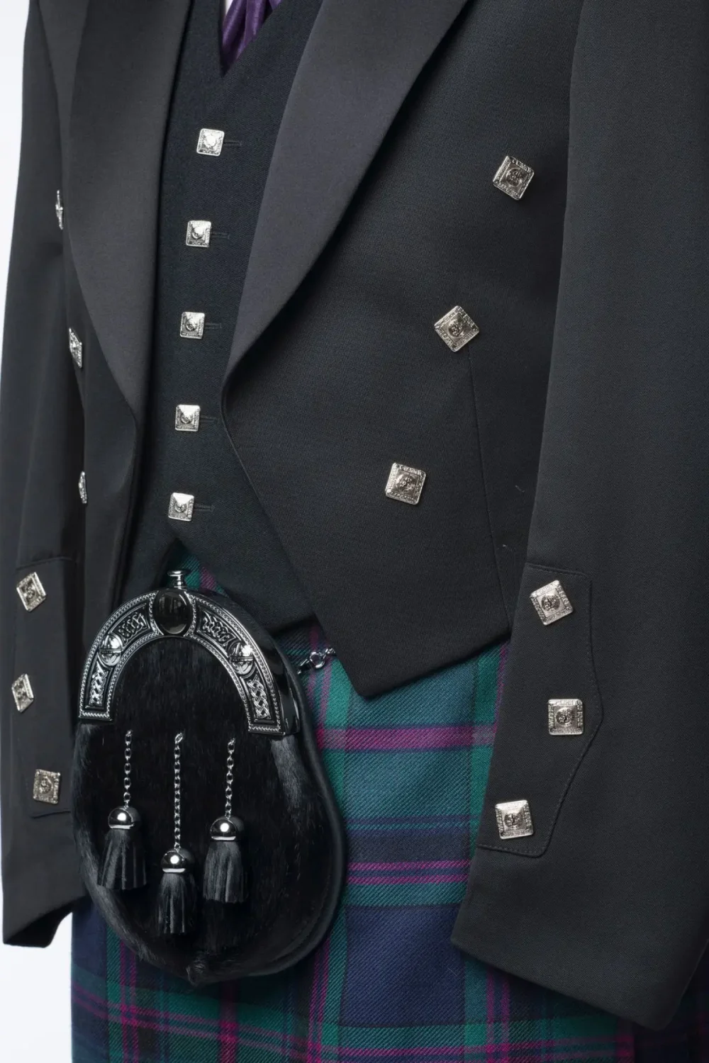 A closeup photo of Prince Charlie Kilt Outfit with 5 button Vest.