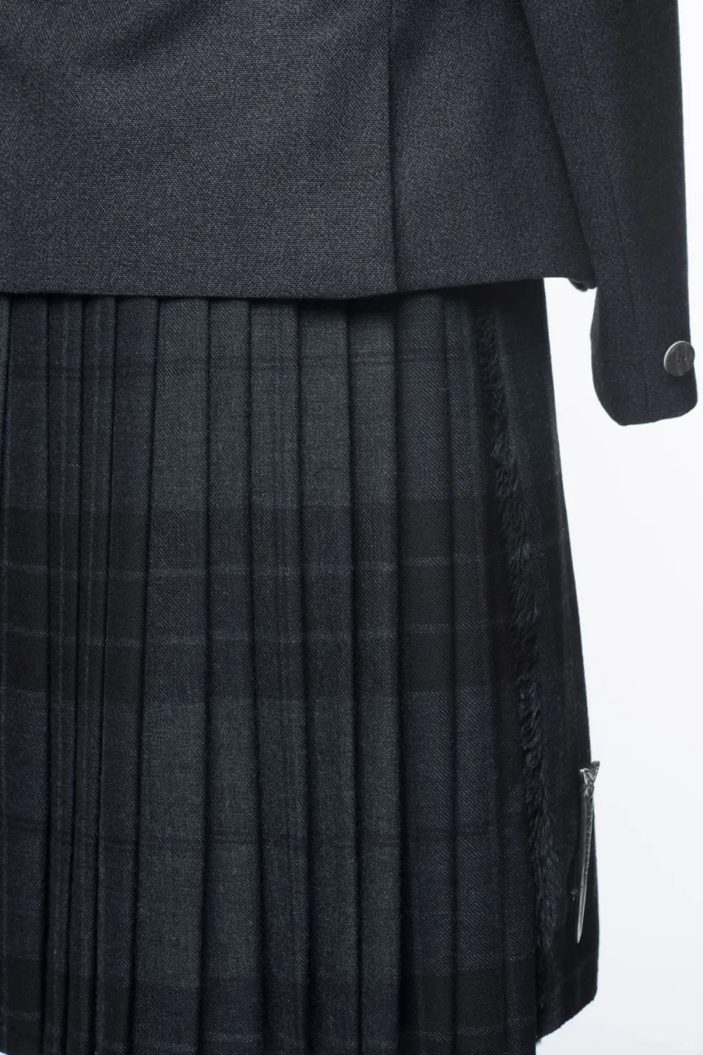 Une photo de dos de la tenue Tweed Kilt.